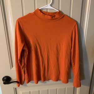 Orange turtleneck